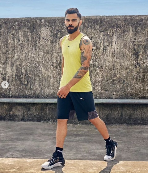 virat in active wear before a run